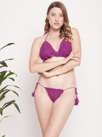 Women's purple crochet bikini set with halter neck and tassel-tie bottoms